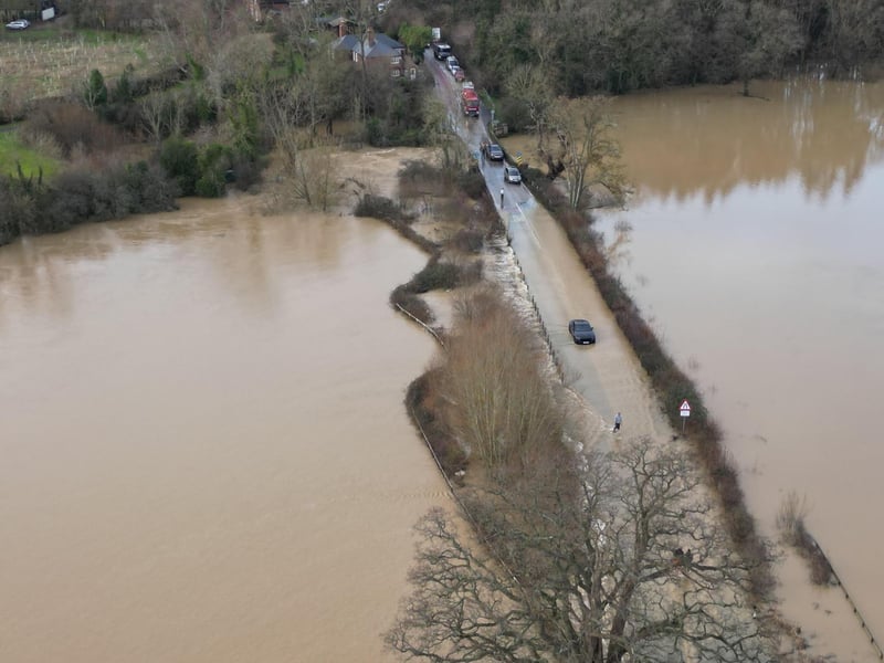Members of the public helped drivers stuck in the flood water on the route from Billingshurst to Wisborough Green on Friday, January 5