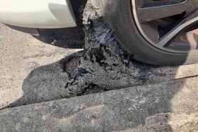 Shirley Lynn's car sank into tarmac near her home in Horsham and 'lifted' the road surface as she drove off - two months after the road had been re-surfaced