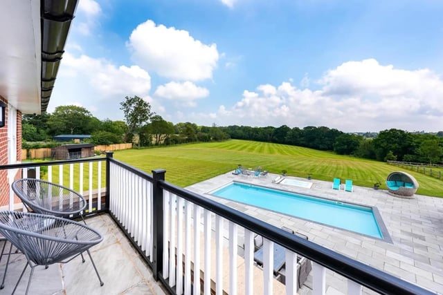 Situated in Cuckfield, this seven-bedroom family home has a swimming pool and outbuildings