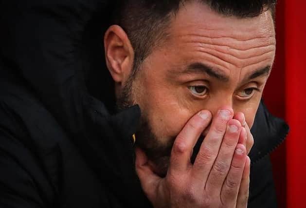Brighton's Italian head coach Roberto De Zerbi reacts during the defeat at Nottingham Forest