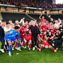 The Crawley Town players and Crawley Town manager Scott Lindsey celebrate victory in front of their supporters during the EFL Sky Bet League 2 play-off second leg match between Milton Keynes Dons and Crawley Town at stadium:mk, Milton Keynes, England on 11 May 2024. Picture: Dennis Goodwin/ProSportsImages