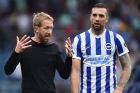 Graham Potter, Manager of Brighton and Hove Albion speaks with Shane Duffy. (Photo by Nathan Stirk/Getty Images)