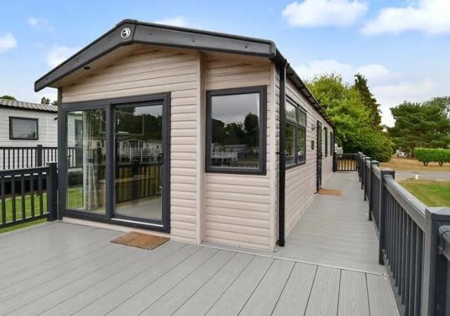 There is a side decking area which leads to the verandah