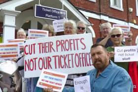 Local residents outside St Leonards Warrior Square protest against the planned closure of thousands of railway ticket offices.
