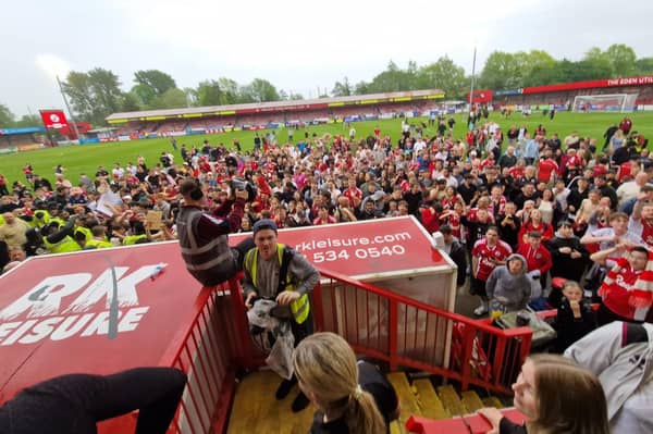 The scenes after Crawley Town secured their Football League status | Picture by Mark Dunford