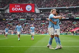 Riyad Mahrez of Manchester City celebrates after scoring the team's second goal during the FA Cup Semi Final match against Sheffield United