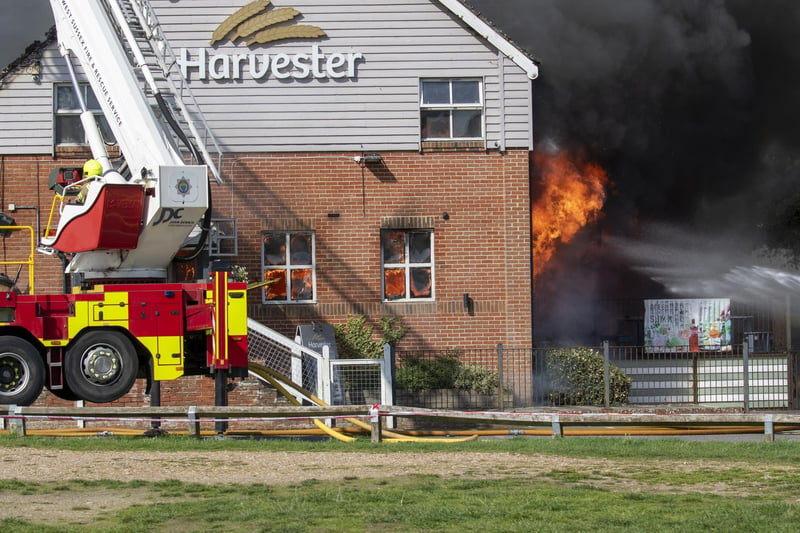 Crews are currently in attendance tacking the huge fire at the Harvester restaurant. Residents have been told to avoid the area and keep doors and windows closed.  Photo credit: https://barnsite.picfair.com/