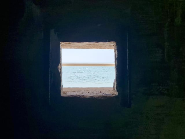 Pete Coe, one of the project leaders, and fellow former Royal Engineer Graham Cosham worked together to open the southern embrasure at the Ferring pillbox