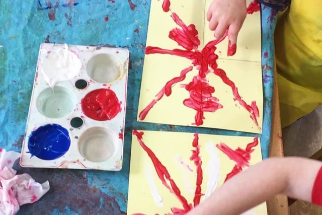 The children dressed as Kings and Queens for the day, and used their fingers to paint flags and the Queen