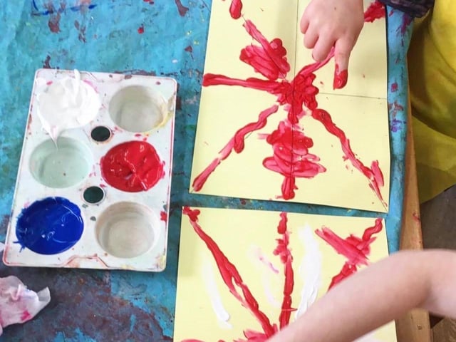 The children dressed as Kings and Queens for the day, and used their fingers to paint flags and the Queen