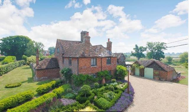 This charming 16th century rural Sussex house with a swimming pool, separate annexe and pool is on the market with a guide price of £2,395,000