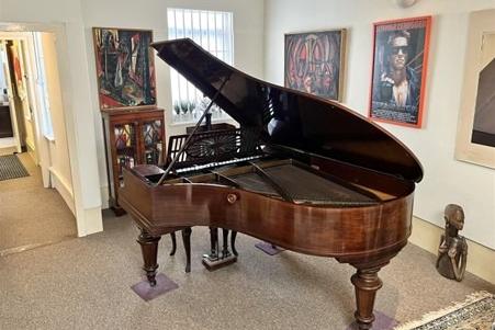 Grand piano featured by current residents.