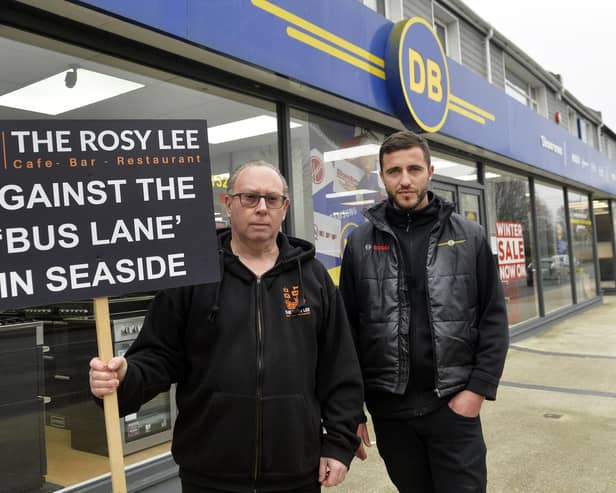 Kevin Gillett and Tom Baxter protest against the new bus lane in Seaside. Photo: Jon Rigby