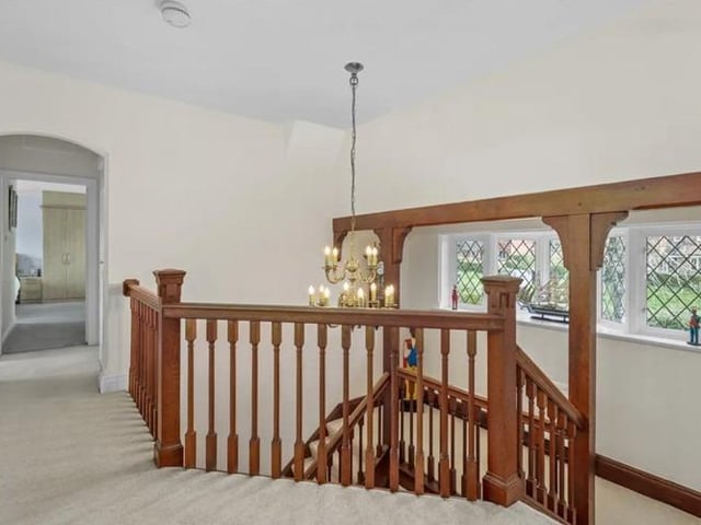 The impressive traditional wooden front double doors open into a welcoming entrance hall which draws you immediately to the eye catching wooden stair case, galleried landing and double height ceilings.
