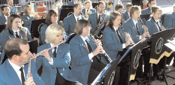 Musicians play in the bandstand in Queens Square