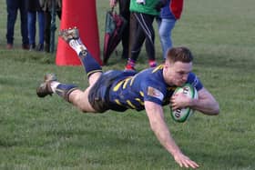 Curtis Barnes crosses in style for Raiders | Picture: Colin Coulson