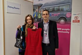 Guild Care area manager Darren Bamber with Charity Shop Girl Jen Graham, who found a fabulous Hobbs dress and matching boots at the charity's Hove shop