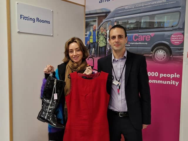 Guild Care area manager Darren Bamber with Charity Shop Girl Jen Graham, who found a fabulous Hobbs dress and matching boots at the charity's Hove shop