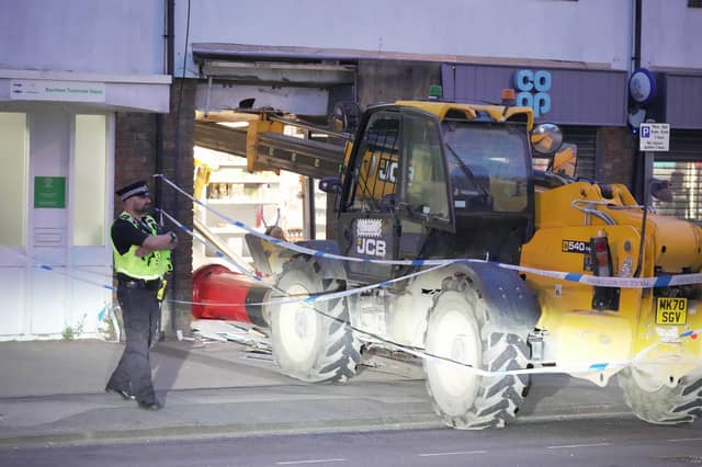 Response units came across a ‘crane attempting to steal an ATM from a supermarket’ in Barnham Road, with one man taken into police custody