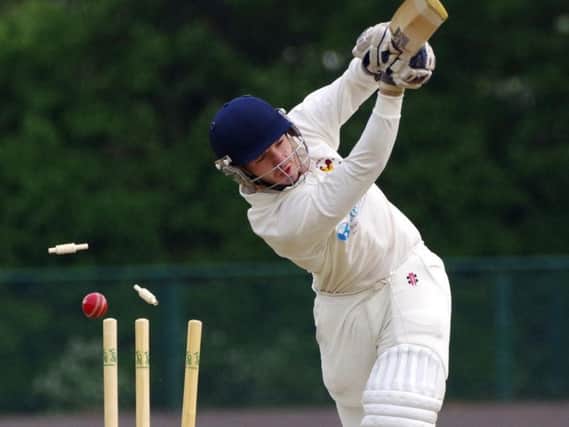St Peter's' Sam Wheatley is bowled by Heathfield's Daniel James. Picture by Danny Simpson