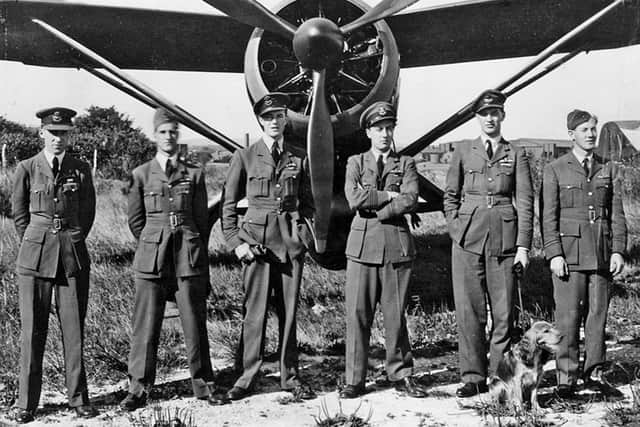 Flight Lieutenant Robin Hooper (left) with a group of No 161 Squadron pilots at Tangmere in 1943. Picture courtesy of Tangmere Military Aviation Museum