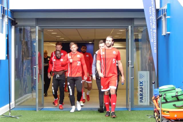 Crawley Town players emerge from the tunnel at the Amex to face Brighton U23s in the Parafix Sussex Senior Cup final