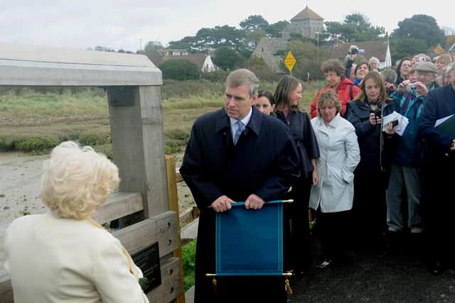 Prince Andrew talking to Liza McKinney as he unveils a plaque at the official reopening of the Old Toll Bridge in Shoreham
