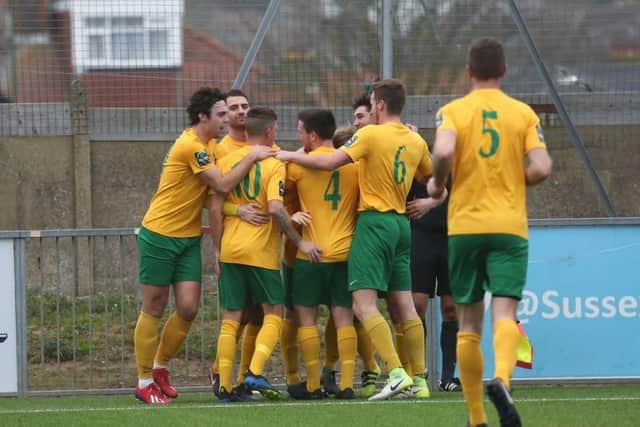 Horsham celebrate going 2-0 up in their 2-1 win over Hythe Town.