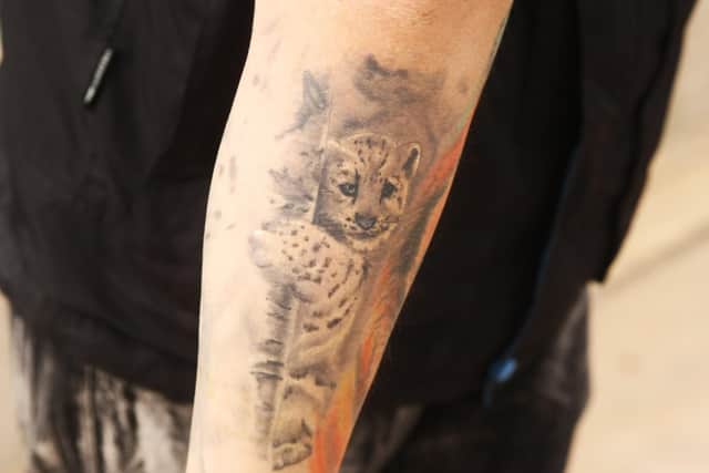 The snow leopard cub tattoo that Gary Broughton got to celebrate his cancer being removed. Picture: Derek Martin