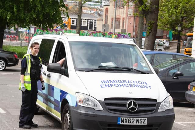 Immigration officers at the site in Brighton