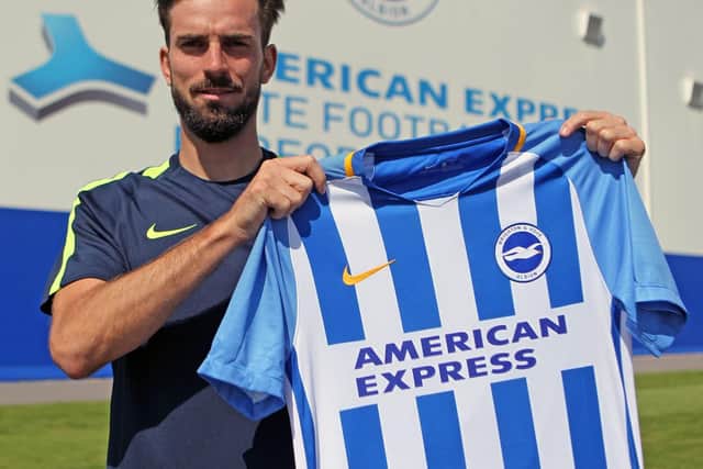 Davy Propper pictured holding Albion's home shirt after joining the club in August. Picture by Paul Hazlewood/BHAFC