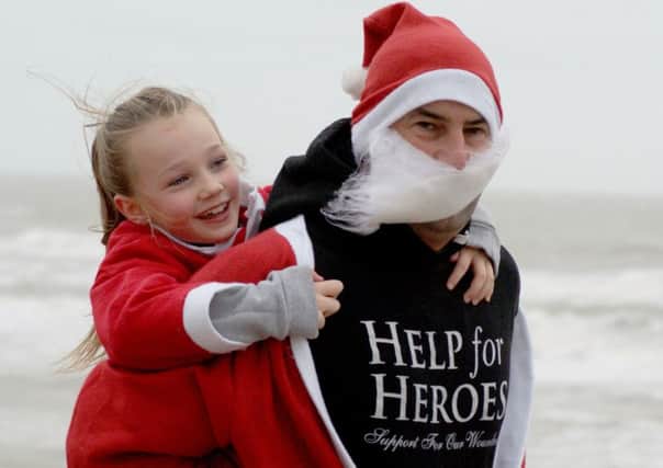 Bexhill Lions' Family Santa Dash 2015. Photo by Derek Canty. SUS-150612-131541001