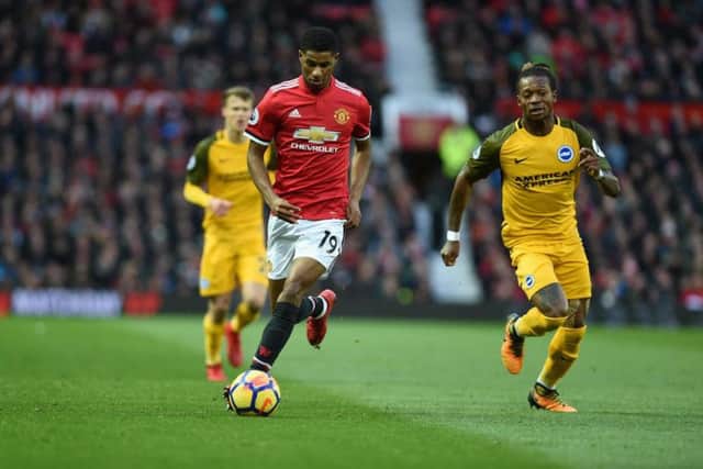 Gaetan Bong tracks Marcus Rashford as Brighton & Hove Albion took on Manchester United at Old Trafford. Picture by PW Sporting Pics