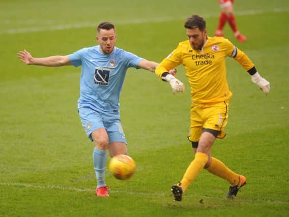 Coventry City's Marc McNulty tries to get the ball from Crawley Town's Glenn Morris. Picture by Nick Wilkinson/Coventry Telegraph