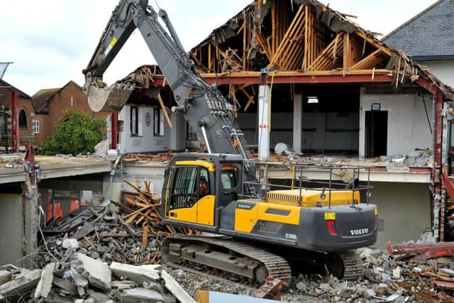 Demolition has started on the old Waitrose building, Piries Place Horsham. Pic Steve Robards SR1728609 SUS-171127-155253001