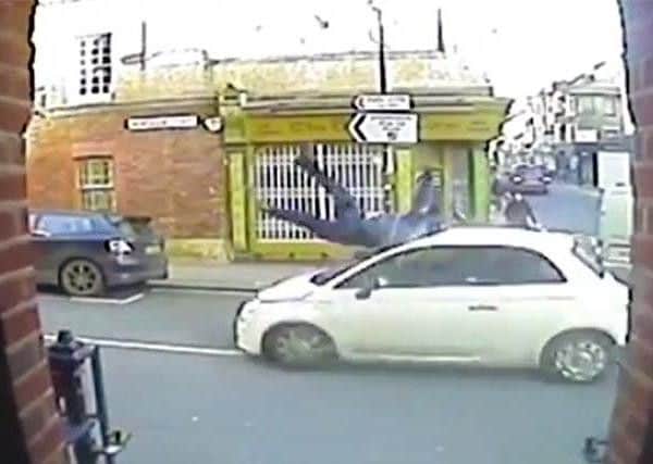 Still taken of CCTV footage of the incident (Photograph: Sussex Police)
