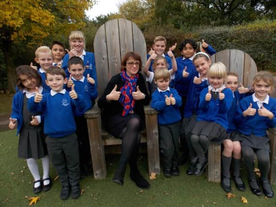 Headteacher Rachel Nunns and some of the Castlewood Primary children