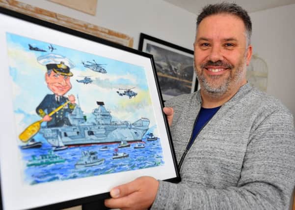 Sean Savage with the caricature he will present on board aircraft carrier HMS Queen Elizabeth. Picture: Steve Robards