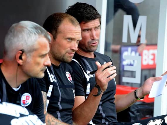 Crawley Town assistant manager Warren Feeney (centre). Picture by Steve Robards