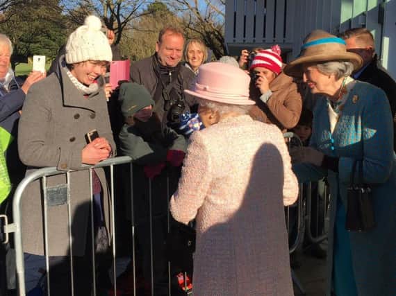The Queen meeting crowds outside Chichester Festival Theatre