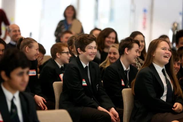 Students from Longhill High School listening to Be the Change presenters