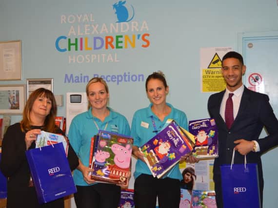 Handing over the advent calendars to the children's hospital