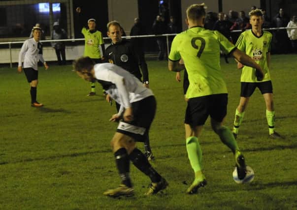 Action from Bexhill United's 2-0 defeat at home to Ringmer last weekend. Pictures by Simon Newstead