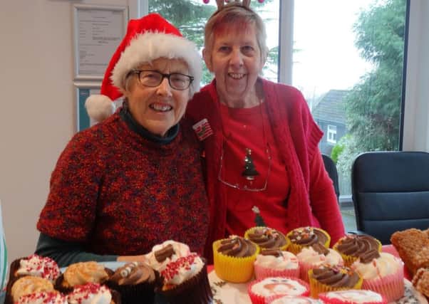 June Griggs and Margaret Gaye with scrummy cupcakes at the Bluebell Ridge Christmas Fair SUS-170512-132700001