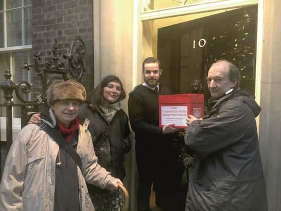 Patrick Glass, Kay Avery and William Bullin deliver residents' demands to 10 Downing Street SUS-171220-111501001