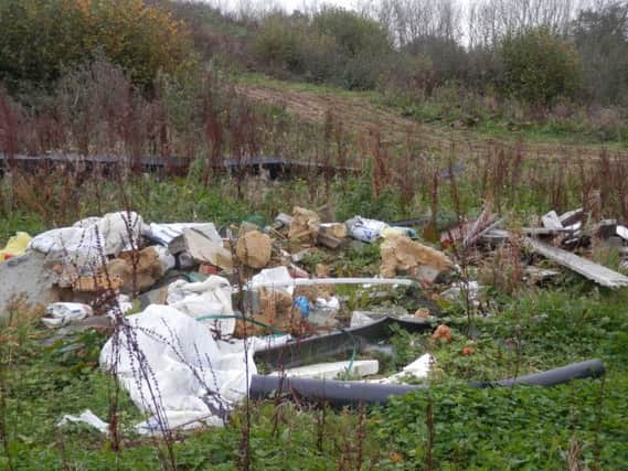 Fly-tipping on North Queensway SUS-170812-102027001