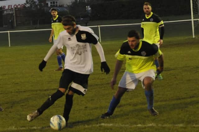Bexhill United midfielder Nathan Lopez in possession.
