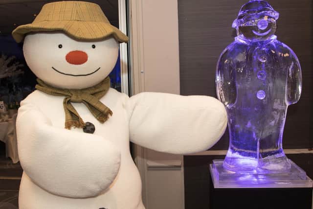 The Snowman with an ice sculpture replica (Photograph: Graham Franks)