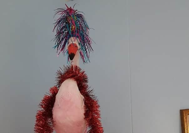Horsham flamingo Floyd has been getting into the Christmas spirit.