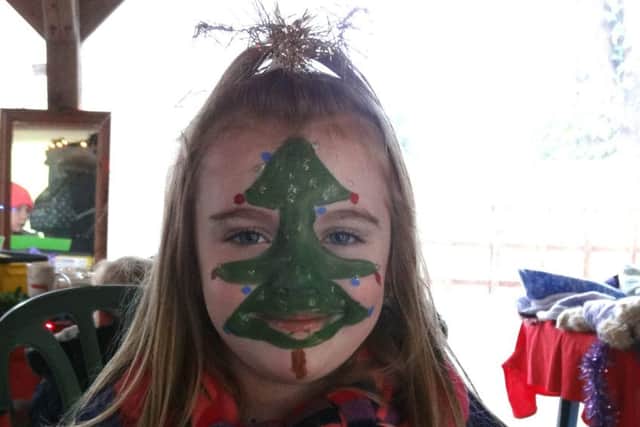 Face painting fun at the Bluebell Ridge Christmas Fair SUS-170512-132716001